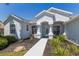 Charming home with manicured landscaping and a welcoming entryway at 12005 Summer Meadow Dr, Lakewood Ranch, FL 34202