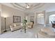 Bright living room with a ceiling fan, wood floors, and neutral decor at 15451 27Th E Ct, Parrish, FL 34219