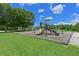 Community playground and recreational area with lush green grass at 15451 27Th E Ct, Parrish, FL 34219
