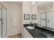 Bright bathroom with framed mirror and tiled floors at 1714 Fairway Trce, Palmetto, FL 34221