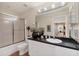 Bathroom showcasing granite counters, a shower, toilet and tiled floors at 1714 Fairway Trce, Palmetto, FL 34221