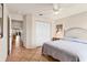 Bright bedroom with tiled floors and a view to the bathroom and living room at 1714 Fairway Trce, Palmetto, FL 34221