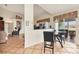 Bright dining area featuring a glass table and modern pendant lighting at 1714 Fairway Trce, Palmetto, FL 34221