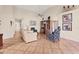 Open living room with tile flooring, vaulted ceilings, and ample seating, ideal for entertaining and relaxation at 1714 Fairway Trce, Palmetto, FL 34221