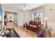 Comfortable living area with tiled flooring, neutral paint, and lots of natural light at 1714 Fairway Trce, Palmetto, FL 34221