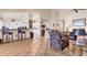 Bright, open living space with tile flooring, bar seating, and seamless transition to the kitchen and living areas at 1714 Fairway Trce, Palmetto, FL 34221