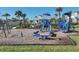 Community playground featuring modern equipment and a safe play area for children at 17902 Cherished Loop, Lakewood Ranch, FL 34211