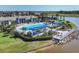 Community pool, clubhouse, and lounging area, perfect for social gatherings and relaxation at 17902 Cherished Loop, Lakewood Ranch, FL 34211