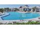 Community pool with lounge chairs and ladders, a refreshing oasis for residents to enjoy the water at 17902 Cherished Loop, Lakewood Ranch, FL 34211