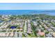 An aerial view of a neighborhood with waterfront homes and lush tropical landscaping at 1806 85Th Nw Ct, Bradenton, FL 34209