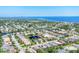 Beautiful aerial view of a neighborhood with ponds, lush trees, and well-manicured lawns at 1806 85Th Nw Ct, Bradenton, FL 34209