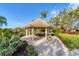 Secluded gazebo overlooking the water offering a peaceful spot in a serene landscape setting at 1806 85Th Nw Ct, Bradenton, FL 34209