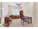 Cozy office space with neutral walls and carpet, complete with classic wood furniture and a bright window at 1806 85Th Nw Ct, Bradenton, FL 34209