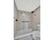 Modern bathroom featuring a tiled walk-in shower and neutral color palette at 2311 14Th W Ave # 208, Palmetto, FL 34221