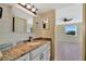 Bathroom vanity with granite countertops and white cabinets at 2311 14Th W Ave # 208, Palmetto, FL 34221