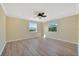 Bright bedroom featuring recessed lighting, ceiling fan, and wood-look floors at 2311 14Th W Ave # 208, Palmetto, FL 34221