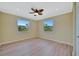 Bedroom with natural light, ceiling fan, and two windows at 2311 14Th W Ave # 208, Palmetto, FL 34221