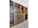 Spacious walk-in closet with custom wood shelving and drawer storage at 2311 14Th W Ave # 208, Palmetto, FL 34221