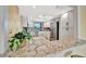 Bright, remodeled kitchen with granite countertops, stainless steel appliances, and modern lighting at 2311 14Th W Ave # 208, Palmetto, FL 34221