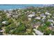 Scenic aerial shot showcasing waterfront homes with stunning views and lush landscaping at 2315 Mcclellan Pkwy, Sarasota, FL 34239
