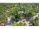 An aerial view of a street with mature trees and homes at 2315 Mcclellan Pkwy, Sarasota, FL 34239