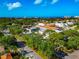 Overhead view of homes and streets with a serene coastal backdrop, illustrating the area's desirable location and lifestyle at 236 Harbor S Dr # 205, Venice, FL 34285