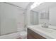 Bright bathroom featuring a shower-tub combination, tile surround, and modern vanity at 236 Harbor S Dr # 205, Venice, FL 34285