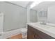 Bathroom features a shower-tub combo, vanity with sink, and a mirror at 236 Harbor S Dr # 205, Venice, FL 34285