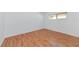 Empty room boasts hardwood flooring, great for a fresh start at 236 Harbor S Dr # 205, Venice, FL 34285