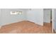 The bedroom features wood floors, closet, and access to the ensuite bathroom at 236 Harbor S Dr # 205, Venice, FL 34285