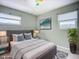 Comfortable bedroom features a cozy bed, soft lighting, and a relaxing ambiance at 2802 Swifton Dr # V102, Sarasota, FL 34231