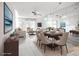 Bright dining room featuring a wooden dining table with seating for six and tile flooring at 2802 Swifton Dr # V102, Sarasota, FL 34231
