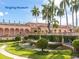 The Ringling Museum with pink architecture, manicured gardens, statues and palm trees under a clear blue sky at 2802 Swifton Dr # V102, Sarasota, FL 34231