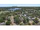 Aerial view of property showcasing neighborhood, nearby golf course, and waterway in a beautiful, lush location at 322 35Th Ne Ave, St Petersburg, FL 33704