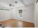 Bedroom with hardwood floors, ceiling fan, recessed lighting, and large windows for natural light at 322 35Th Ne Ave, St Petersburg, FL 33704