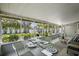 Sunroom with ample natural light and views of the landscaped backyard at 322 35Th Ne Ave, St Petersburg, FL 33704