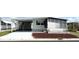 Charming home with covered parking and a comfortable screened in porch at 3221 Sweet Bay Ter, Sarasota, FL 34237