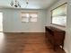 Bright living room with wood floors and classic furnishings at 3221 Sweet Bay Ter, Sarasota, FL 34237