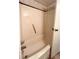 Shower and tub showcasing a built-in seat and sleek fixtures at 3221 Sweet Bay Ter, Sarasota, FL 34237