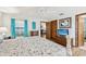 Comfortable bedroom with ensuite bathroom and walk-in closet at 338 Indian Key Way # 111, Englewood, FL 34223