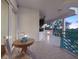 Cozy balcony with outdoor seating, perfect for enjoying tranquil views at 340 Gulf Of Mexico Dr # 124, Longboat Key, FL 34228
