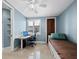 Bright bedroom has a desk, daybed, and closet for ample storage at 340 Gulf Of Mexico Dr # 124, Longboat Key, FL 34228