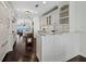 Elegant kitchen featuring granite countertops and a view of the outdoor scenery at 340 Gulf Of Mexico Dr # 124, Longboat Key, FL 34228