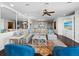 Spacious living room with large sectional, stylish decor, and ocean view at 340 Gulf Of Mexico Dr # 124, Longboat Key, FL 34228