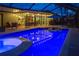 Beautiful pool and hot tub area with screened-in lanai create a lovely outdoor space at 3667 Country Place Blvd, Sarasota, FL 34233