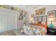 Bedroom featuring a queen-sized bed and vibrant decor, creating a cozy and stylish living space at 3847 Little Country Rd, Parrish, FL 34219