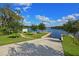 Scenic community boat ramp offers easy access to the serene waterfront, perfect for boating and water activities at 3847 Little Country Rd, Parrish, FL 34219