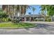 Charming clubhouse exterior with lush landscaping and inviting entrance, providing a welcoming community gathering space at 3847 Little Country Rd, Parrish, FL 34219