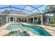 Sparkling pool with a screened enclosure, perfect for relaxing and entertaining in a private outdoor oasis at 3847 Little Country Rd, Parrish, FL 34219