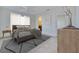 Serene bedroom with ample natural light, neutral decor, and ceiling fan at 3904 Ashwood Ln, Sarasota, FL 34232